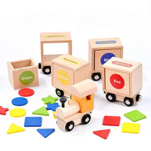 Charger l'image dans la galerie, Enfant assemble train magnétique bois - développement motricité fine
